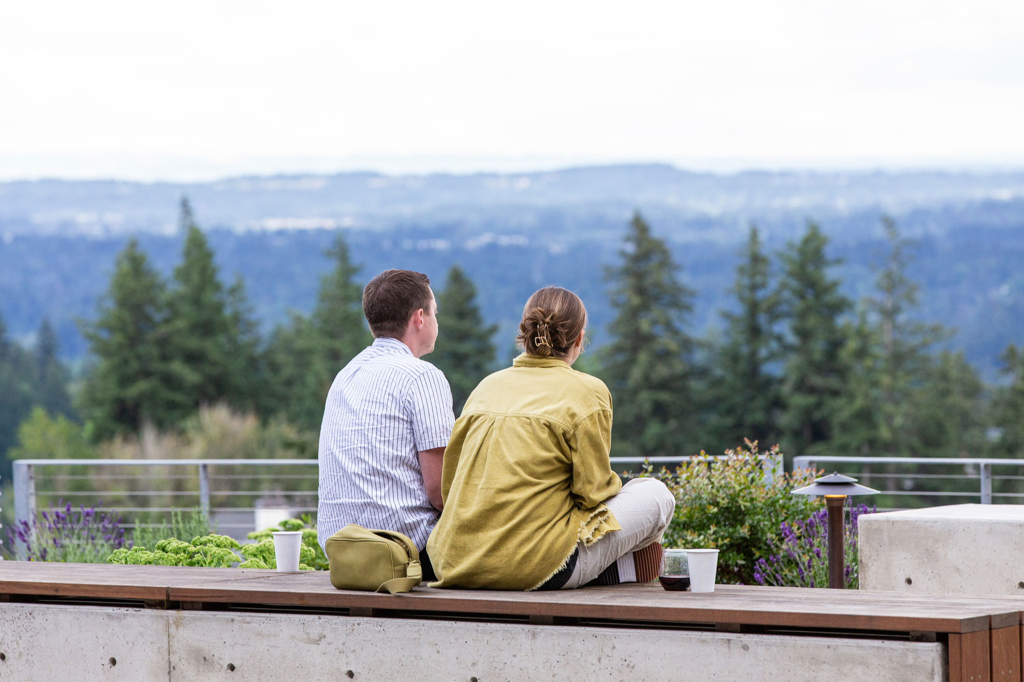 Couple sitting on L1 terrace at Amaterra Portland.